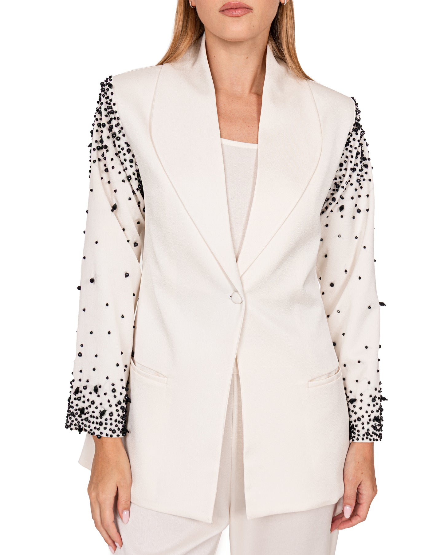 Tailored suit in crème crepe