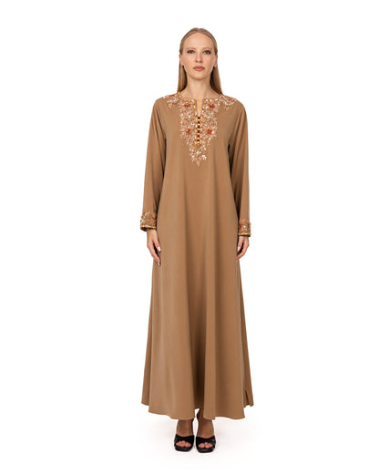 Traditional kaftan in coral nude