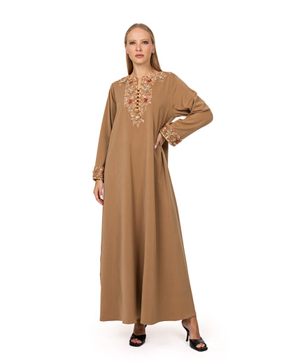 Traditional kaftan in coral nude
