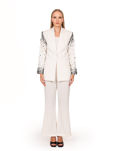 Tailored suit in  crème crepe