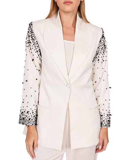 Tailored suit in  crème crepe